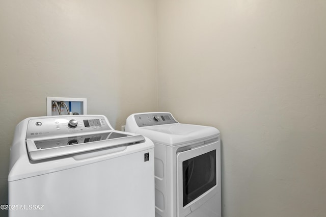 laundry room with laundry area and washer and dryer
