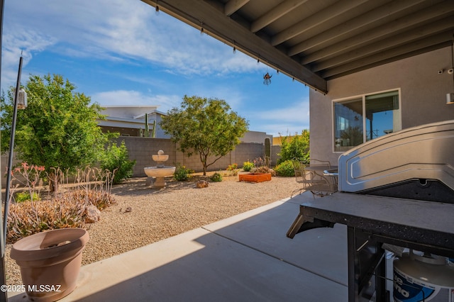 view of patio / terrace with fence
