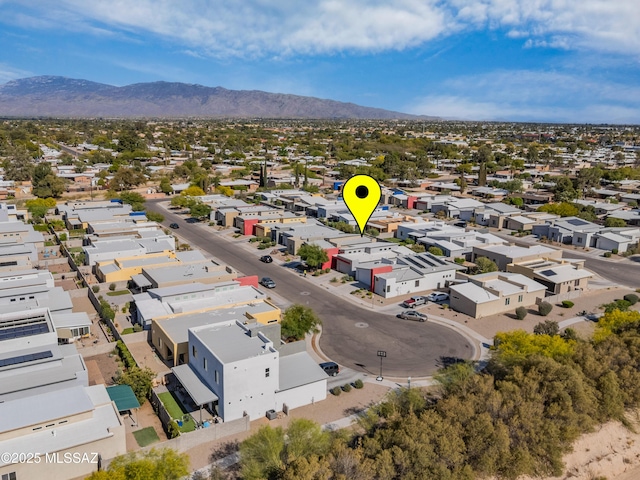 birds eye view of property featuring a residential view and a mountain view