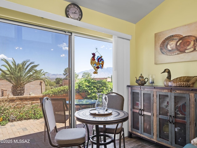 dining room featuring a mountain view