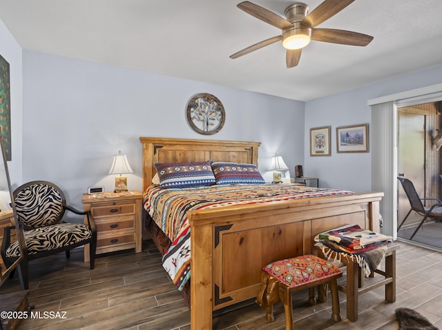 bedroom with wood tiled floor and a ceiling fan