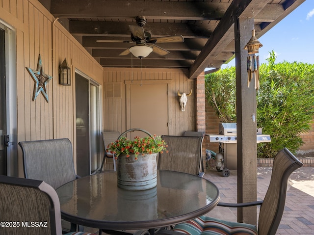 view of patio / terrace with ceiling fan and outdoor dining area