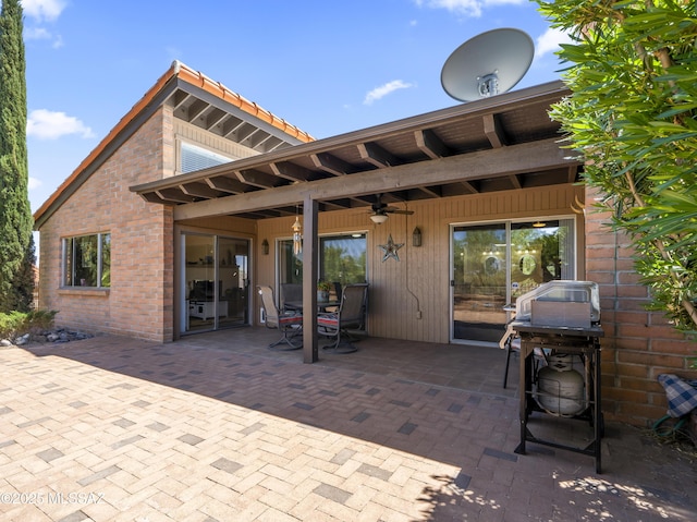 view of patio with ceiling fan