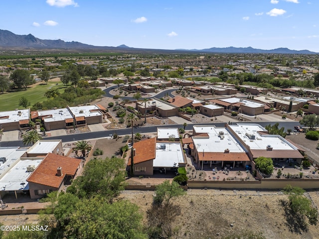 drone / aerial view with a residential view and a mountain view