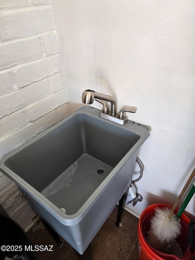 interior details featuring a sink