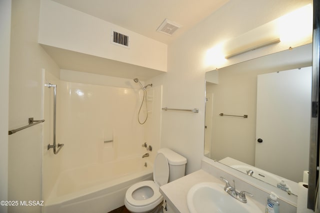 bathroom featuring shower / washtub combination, vanity, toilet, and visible vents