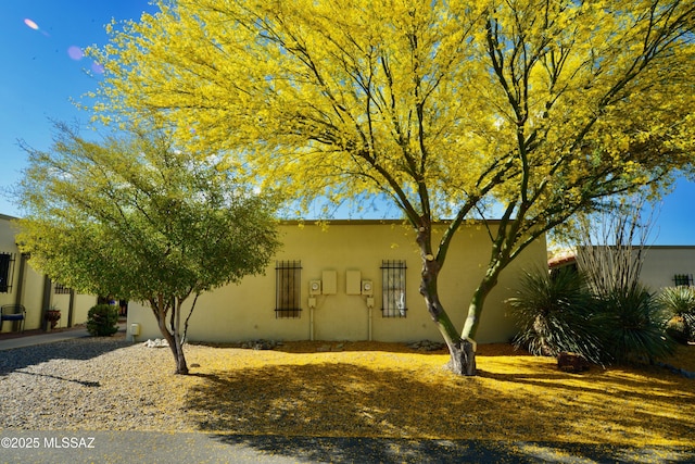 view of front of home featuring stucco siding