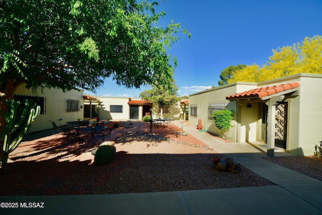 exterior space with a patio area