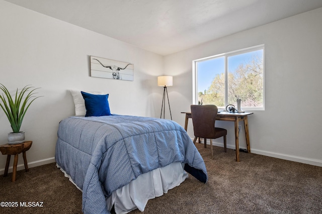 carpeted bedroom with baseboards