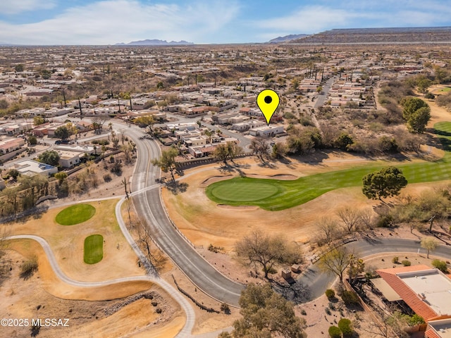 birds eye view of property featuring a residential view, a mountain view, and view of golf course