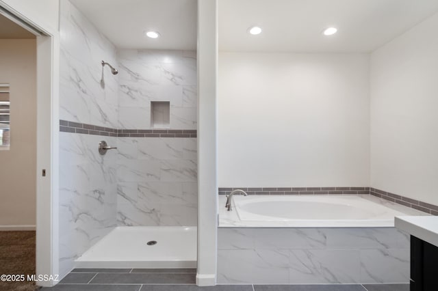 full bath featuring a marble finish shower, a bath, recessed lighting, and vanity
