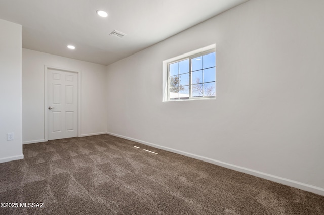 empty room with carpet, baseboards, and recessed lighting