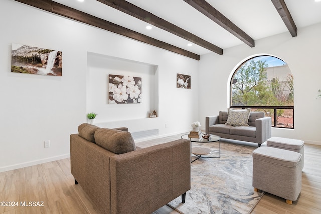 living area with visible vents, beam ceiling, baseboards, recessed lighting, and light wood-style flooring