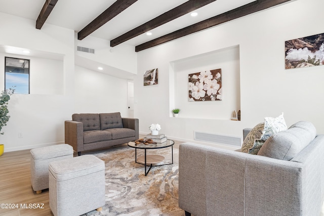 living area with baseboards, recessed lighting, wood finished floors, and visible vents