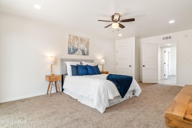 carpeted bedroom featuring recessed lighting, baseboards, visible vents, and a ceiling fan