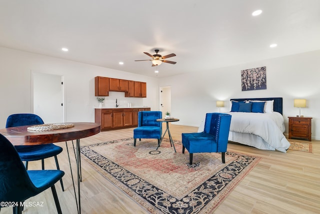 bedroom with light wood-style floors, recessed lighting, baseboards, and ceiling fan