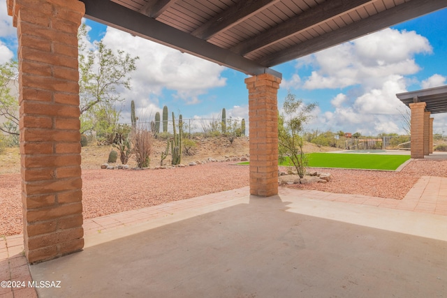 view of patio with fence
