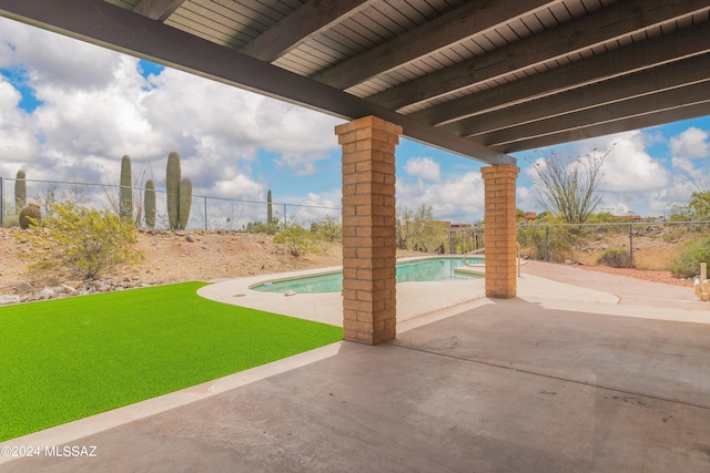 view of patio with a fenced in pool and a fenced backyard