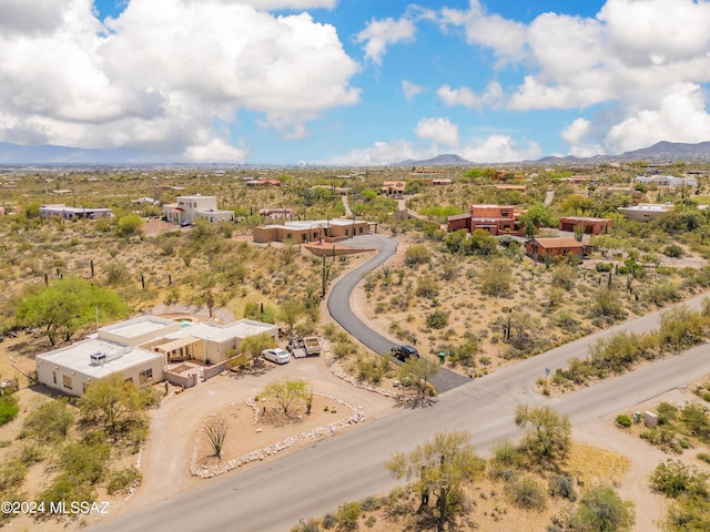 drone / aerial view featuring a mountain view