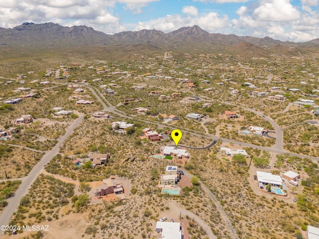 aerial view with view of desert and a mountain view