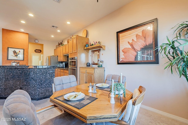 dining room with baseboards, recessed lighting, and visible vents