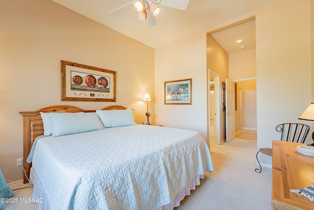 bedroom with a ceiling fan, baseboards, and light colored carpet