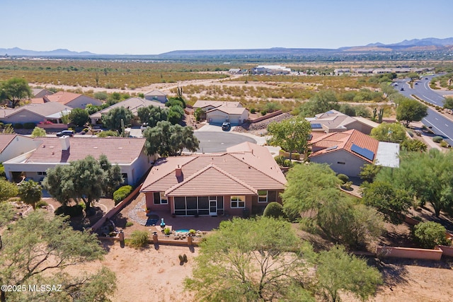 bird's eye view featuring a residential view and a mountain view