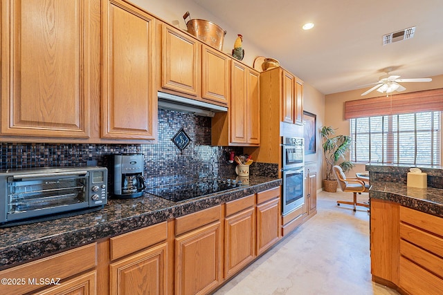 kitchen featuring backsplash, a ceiling fan, visible vents, black electric cooktop, and a toaster
