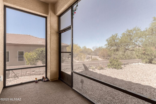 view of unfurnished sunroom