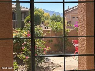 doorway to outside featuring a mountain view
