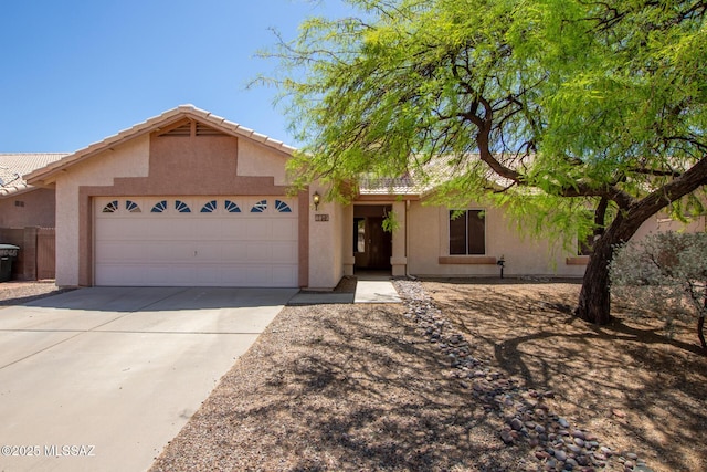 8073 S High Canyon Dr, Tucson, AZ 85747 - ranch-style home featuring stucco siding, an attached garage, driveway, and a tiled roof