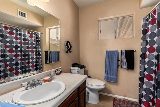 full bath with toilet, visible vents, a shower with shower curtain, tile patterned floors, and vanity