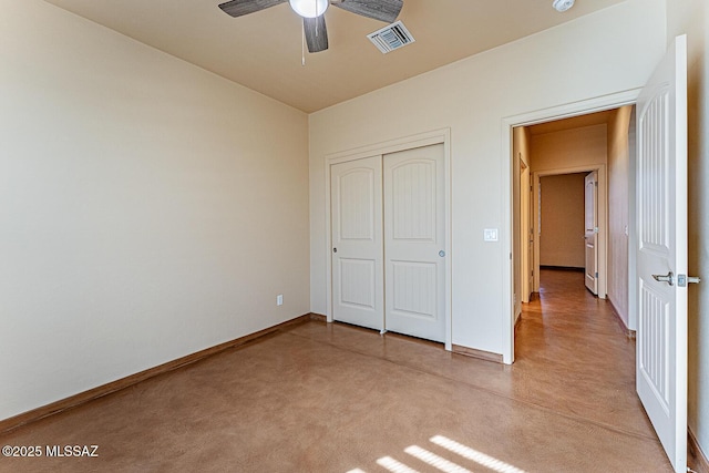 unfurnished bedroom featuring baseboards, ceiling fan, a closet, and visible vents