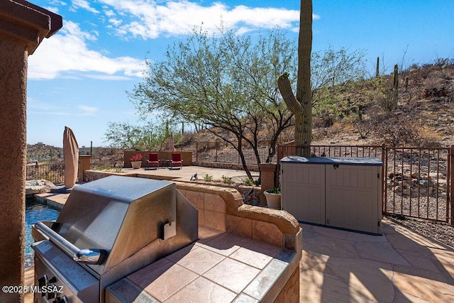 14171 N Gibson Trl, Tucson, AZ 85755 - view of patio featuring area for grilling and a fenced backyard