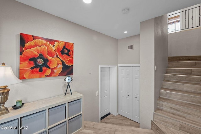 14171 N Gibson Trl, Tucson, AZ 85755 - hallway featuring stairway, light wood finished floors, and recessed lighting