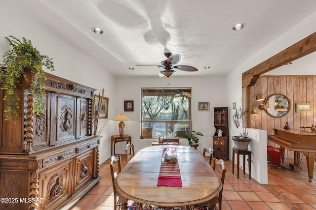 dining room with a textured ceiling, ceiling fan, recessed lighting, and light tile patterned flooring