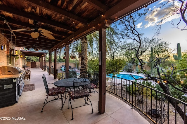 view of patio / terrace featuring ceiling fan, fence, grilling area, a fenced in pool, and outdoor dining space