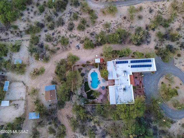 drone / aerial view with view of desert