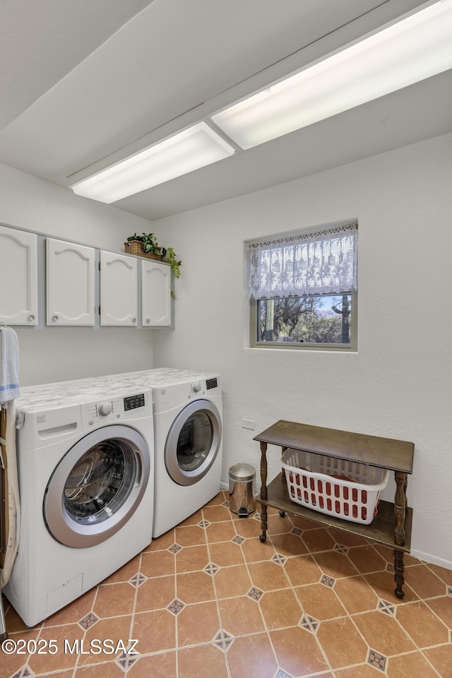 3825 N Silver Dr, Tucson, AZ 85749 - laundry area with separate washer and dryer and cabinet space