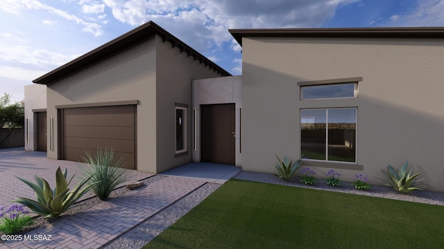 242 E Placita Haciendas Del Lago, Sahuarita, AZ 85629 - contemporary home featuring stucco siding, an attached garage, decorative driveway, and a front lawn