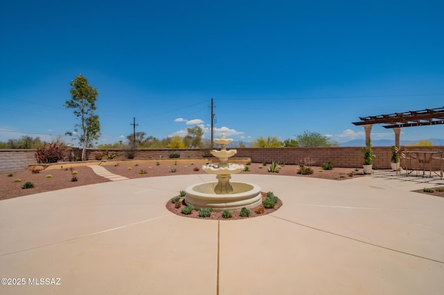 view of patio with a fenced backyard