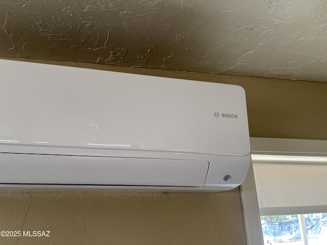 interior details featuring a wall mounted air conditioner