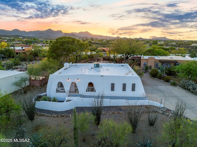 aerial view at dusk with a mountain view
