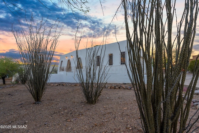 view of property exterior with stucco siding