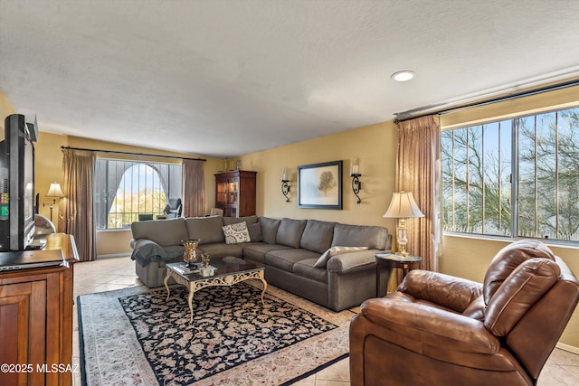 living area featuring light tile patterned floors