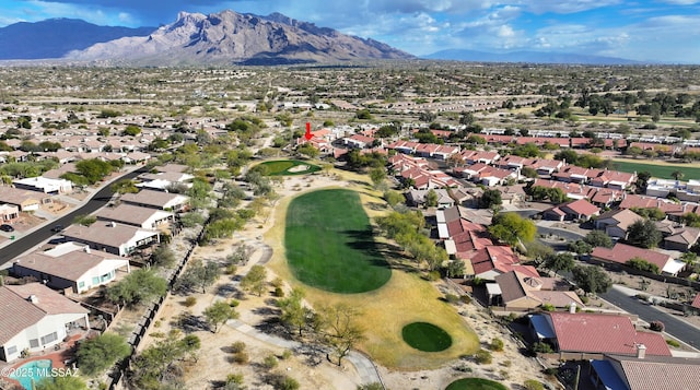 birds eye view of property featuring a residential view, a mountain view, and golf course view