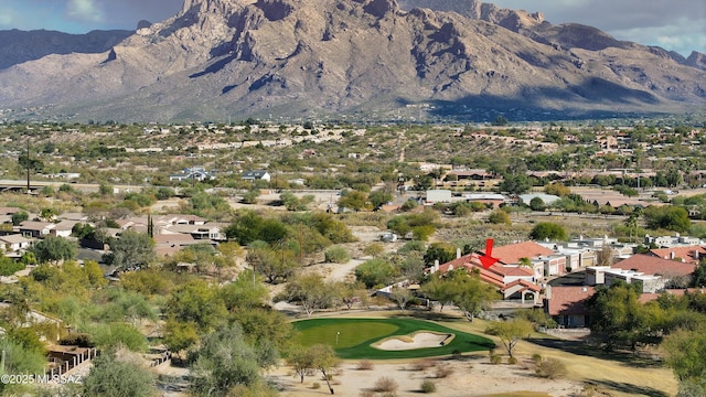 property view of mountains with a residential view and golf course view