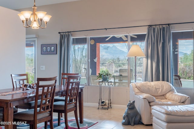 2740 E Ponce Ct, Green Valley, AZ 85614 - dining space with a chandelier, light tile patterned floors, and baseboards