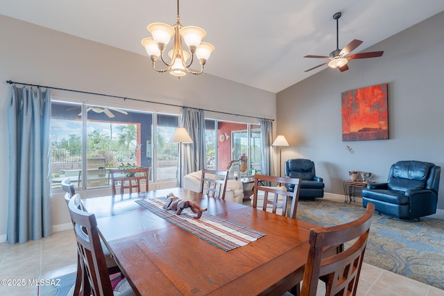 2740 E Ponce Ct, Green Valley, AZ 85614 - dining room featuring light tile patterned floors, ceiling fan, a chandelier, high vaulted ceiling, and baseboards