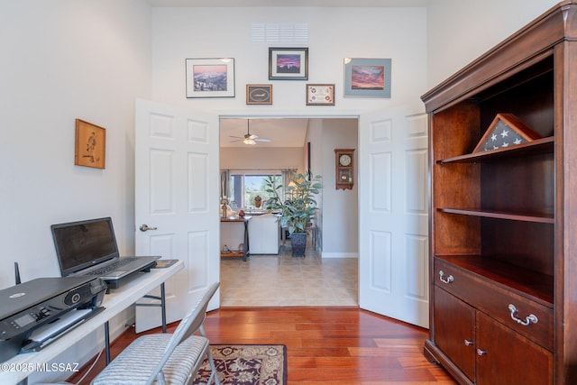 2740 E Ponce Ct, Green Valley, AZ 85614 - office featuring a ceiling fan and wood finished floors